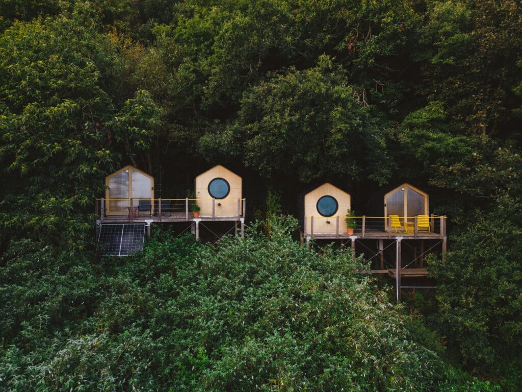 Wild Comfort Devon cabins from drone 2 by Rebecca Douglas Photography 167 Overseas, Birdhouse Coastal Living Devon